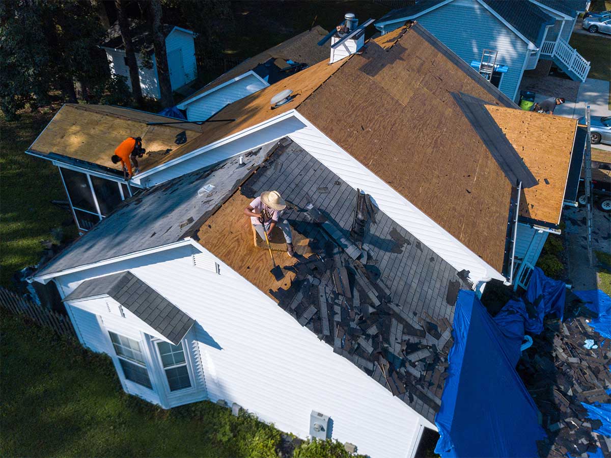 Roofing company working on residential roof